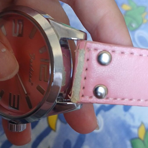 Fashion pink watch with silver used, slight wear