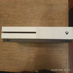 Xbox One S console with two controllers