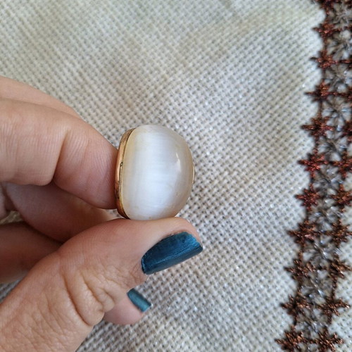Ring with cat's eye stone size 18 used, metal and stone