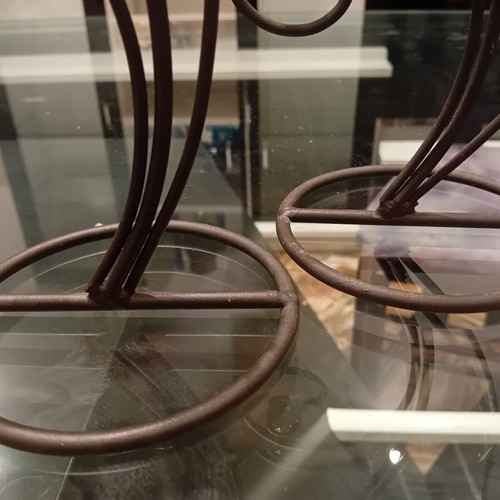 Decorative candle holders set of two used, wrought iron sun design