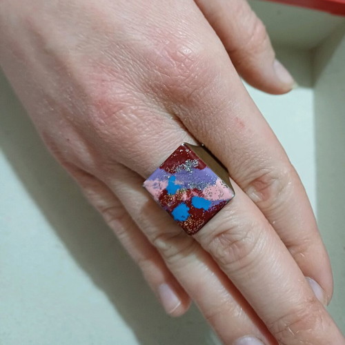 Ring like new painted with colors and glitter