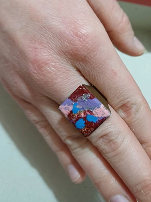 Ring like new painted with colors and glitter