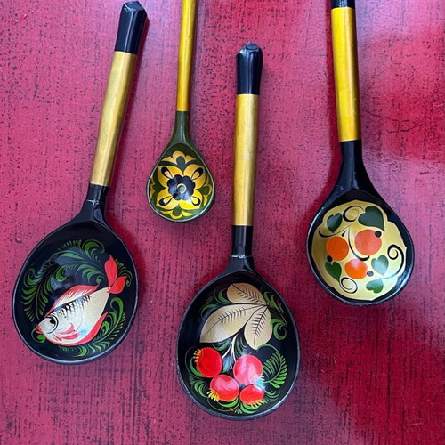 Decorative spoons used, set of 4 wooden with folk motifs