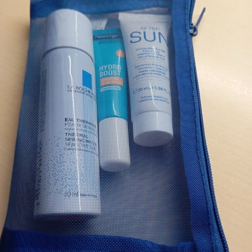 Sun protection beach pouch with sun and after sun creams new