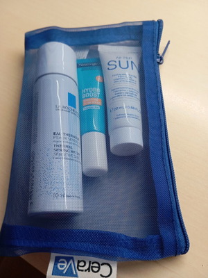 Sun protection beach pouch with sun and after sun creams new