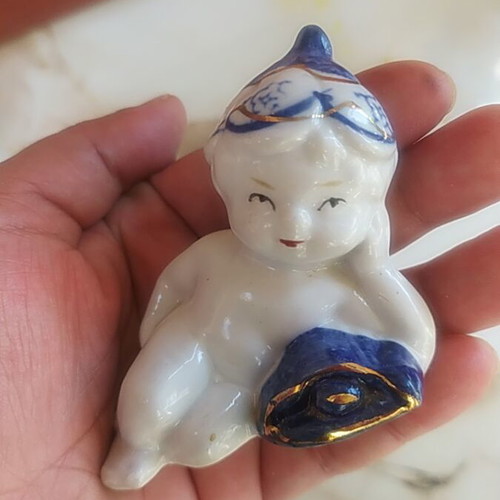 Vintage porcelain figurine small child design like new