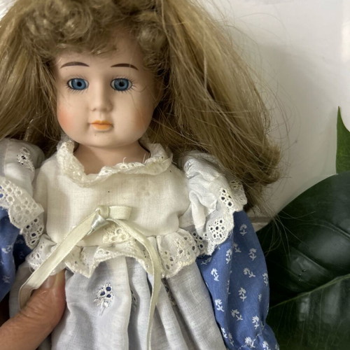 Porcelain doll Germany from the 70s like new