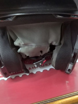 Nolan helmet used, flip-up with tinted visor and side communication