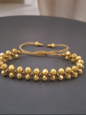 Handmade bracelet with crystals and gold beads with adjustable cord
