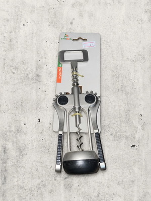 Spring metal corkscrew with non-slip handles