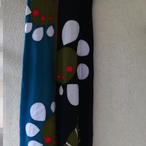 Platinum dress with appliqué designs like new, colorful