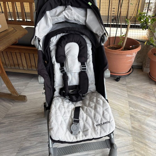 Maclaren Techno XLR stroller used with accessories and carrycot