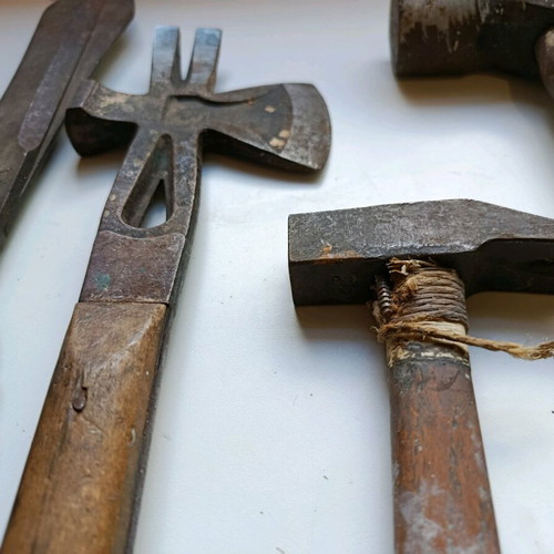 Set of old handmade tools used with wooden handles