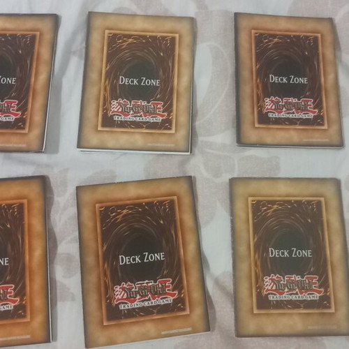 Yu-Gi-Oh! rule books and deck zones, like new, set of 14 each