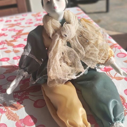 Vintage porcelain Harlequin doll used