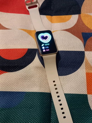 Samsung Galaxy Fit3 used with charger, pink color