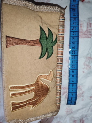 Ethnic fabric bag with embroidered camel and palm tree design