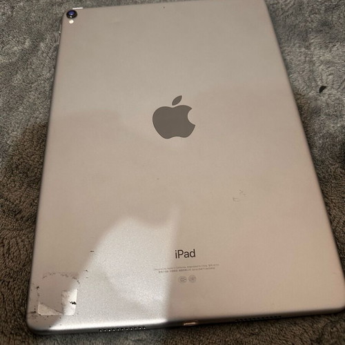 iPad Pro back cover with spare parts and battery