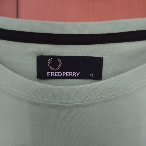 Fred Perry XL t-shirt used with some print cracks, green