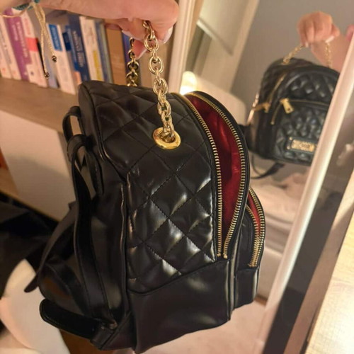 Love Moschino small black backpack like new with gold details