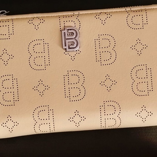 A To Z Greek wallet with multiple compartments, beige yellow