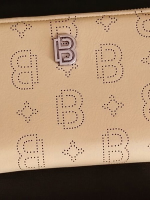A To Z Greek wallet with multiple compartments, beige yellow