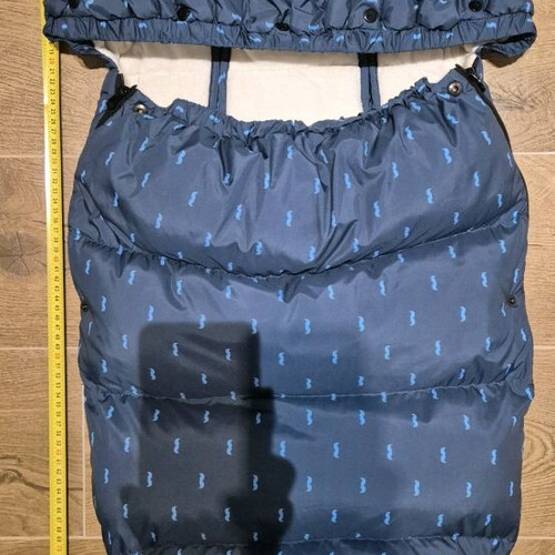Baby footmuff used, warm with slots for straps