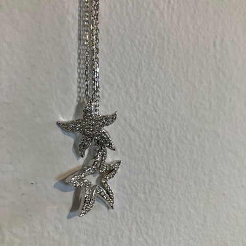 Swarovski double necklace with star pendants like new