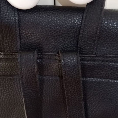 Black synthetic backpack bag used