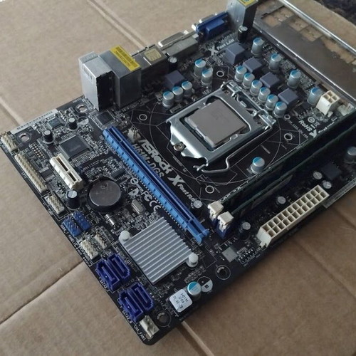 ASRock H61M-DGS motherboard with Intel Pentium G645 CPU, fan and 6GB RAM like new