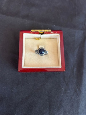 Silver vintage ring with blue-black stone used