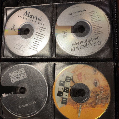 Set of 48 used music CDs with free case