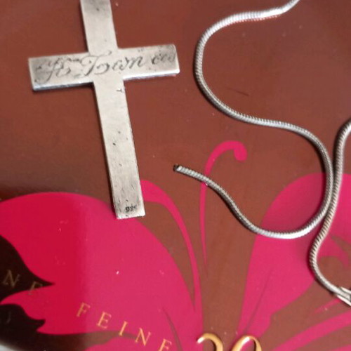 Solid silver cross like new with engraved calligraphic letters