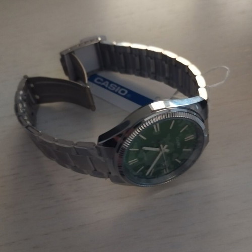 Casio Mtp-1302 watch with green dial 38.5mm
