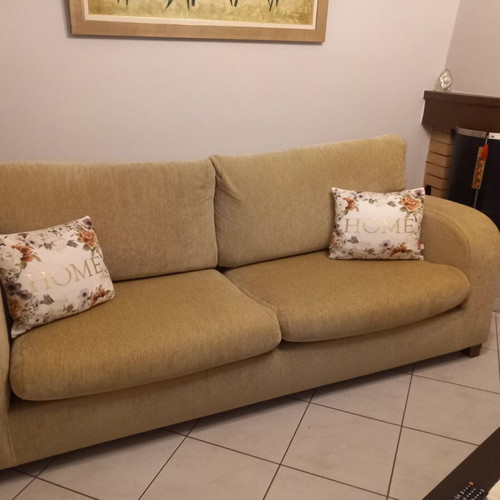 Sofa three-seater used with winter covers and two throws