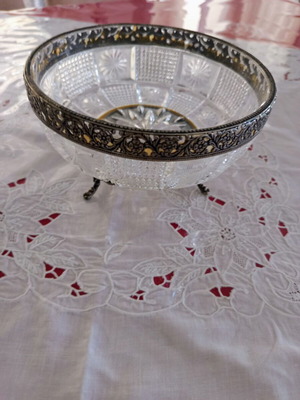 Vintage luxury glass bowl used with embossed metal details
