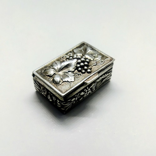 Old silver-plated pill box with embossed decoration like new