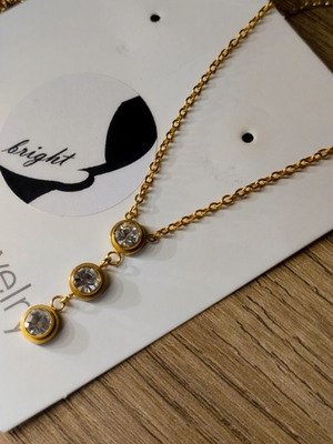 Steel necklace new, gold color