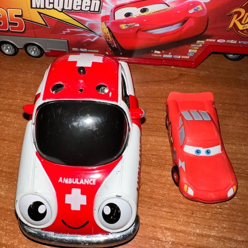 Ambulance toy car used with opening doors and pull-back mechanism
