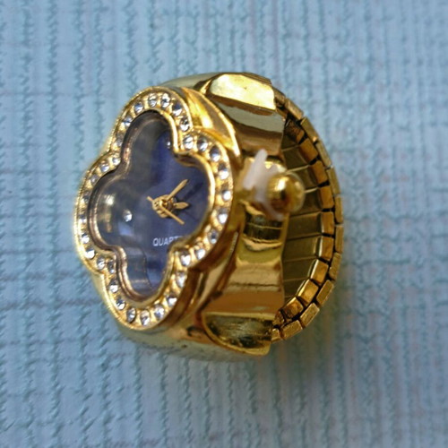 Four-leaf ring like new with quartz watch, blue dial and crystals
