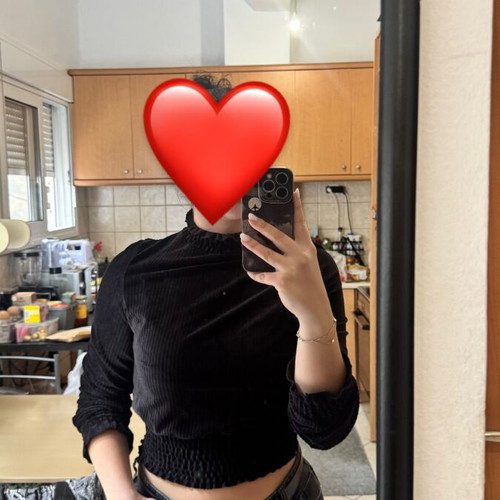 Black ribbed blouse with ruffles, like new, size M