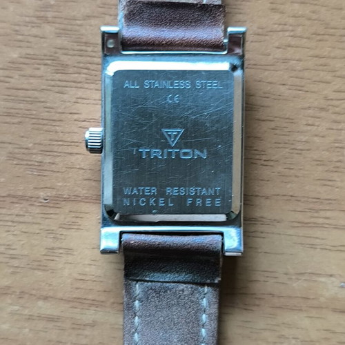 Triton wristwatch with white dial and brown leather strap