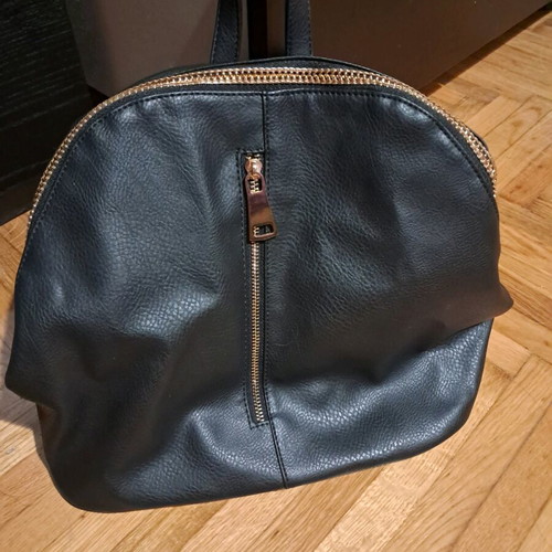 Black backpack with gold zippers like new