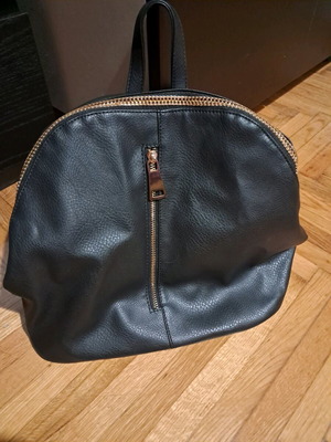 Black backpack with gold zippers like new