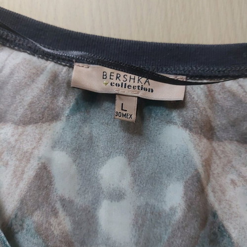 Dress with unique pattern and satin-like shine, size L, like new