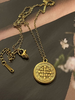Necklace like new, gold tone stainless steel with Saint Benedict medal pendant