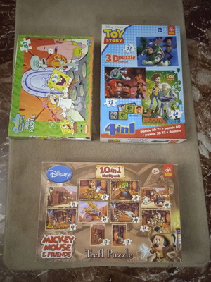 Three children's puzzles like new, set with Toy Story and Mickey Mouse