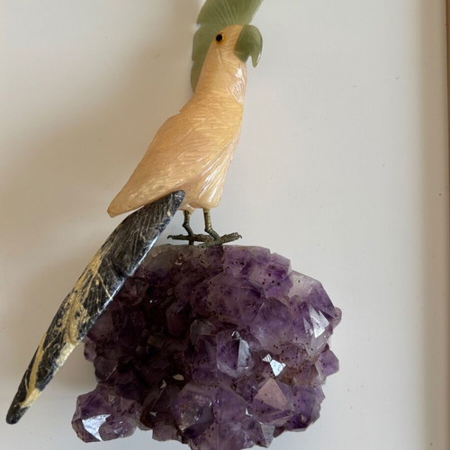 Decorative quartz parrot on raw amethyst base like new
