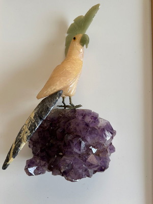 Decorative quartz parrot on raw amethyst base like new