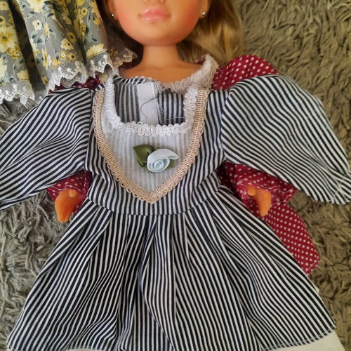 Nancy Famosa doll 2010 with 3 vintage dresses